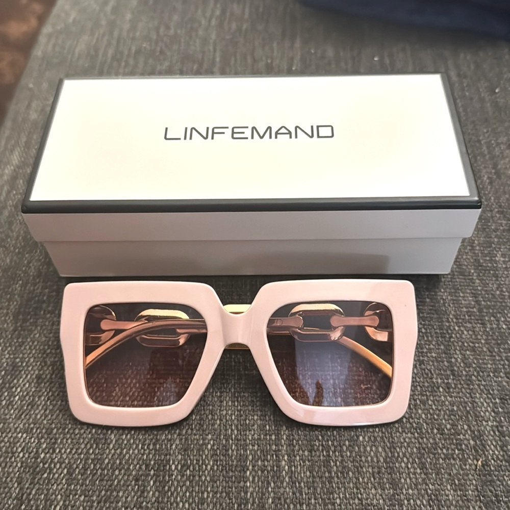 Two pair of Linfemand sunglasses. Brand new in cases and box